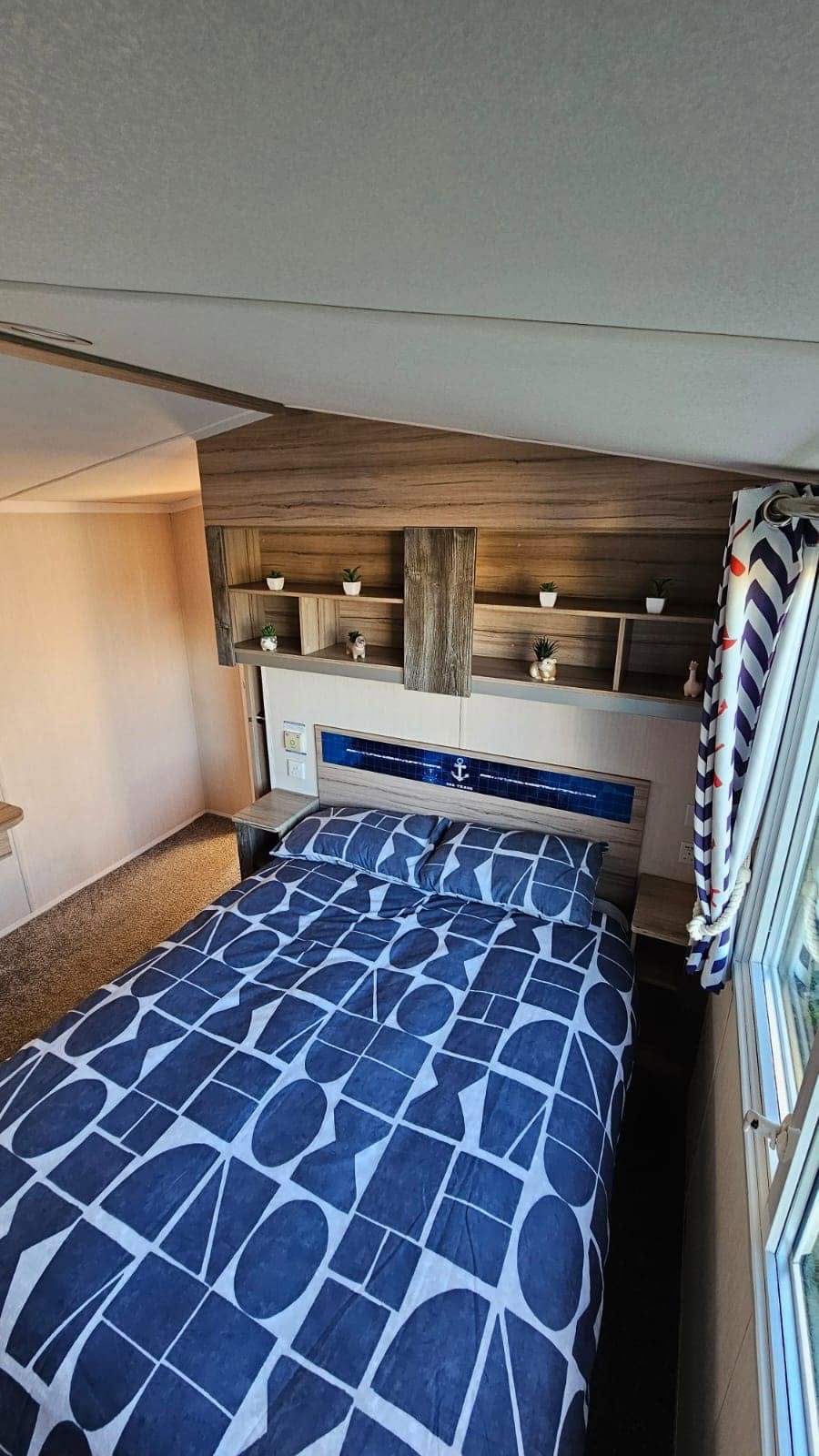 Rossall Court double bedroom with navy anchor bedding