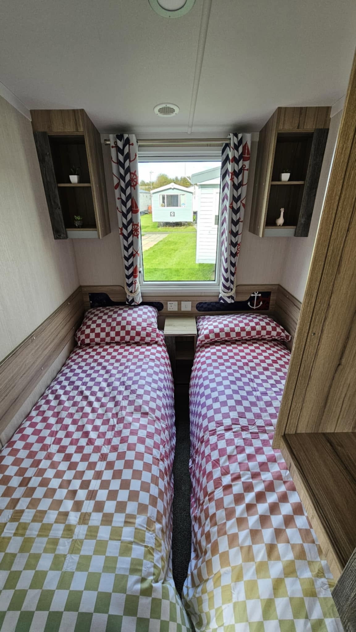 Rossall Court twin bedroom with red checked bedding